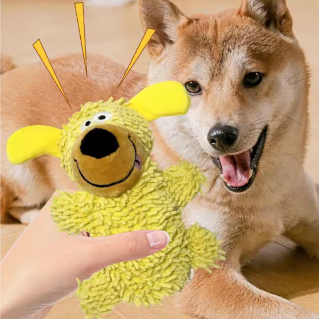 Giggling tooth cleaning toy in dog colours
